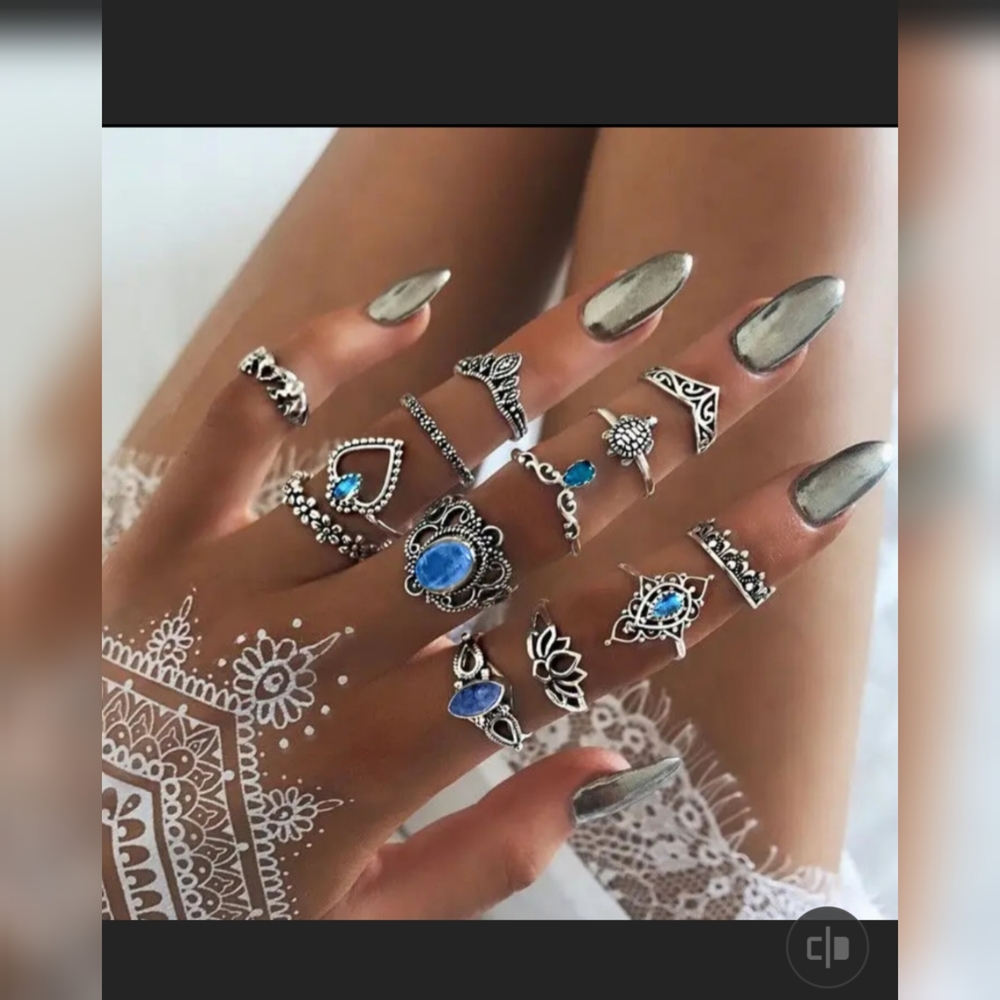 Dainty Silver and Blue Stacking Rings with Intricate Designs